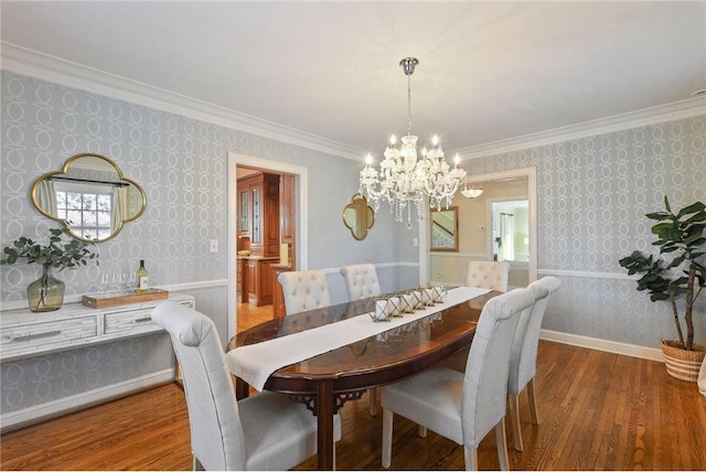 dining space with a notable chandelier, baseboards, wallpapered walls, wood finished floors, and ornamental molding