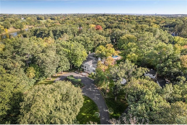 aerial view with a wooded view