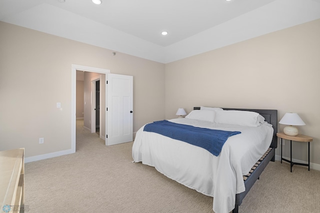 bedroom featuring light colored carpet