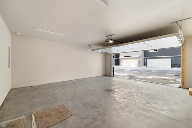 5861 41st St S, Fargo, ND 58104 - garage featuring a garage door opener