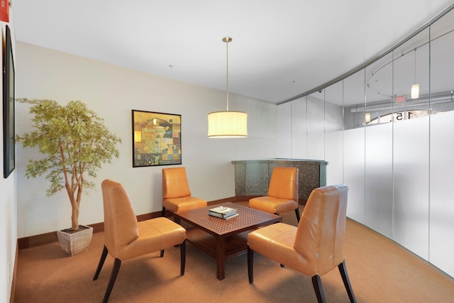 view of carpeted dining area