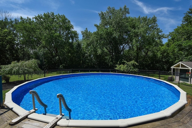 4879 Mayelin Ave NE, Saint Michael, MN 55376 - view of swimming pool featuring view of scattered trees