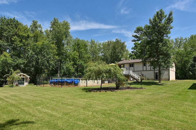 4879 Mayelin Ave NE, Saint Michael, MN 55376 - view of yard featuring stairs and view of scattered trees