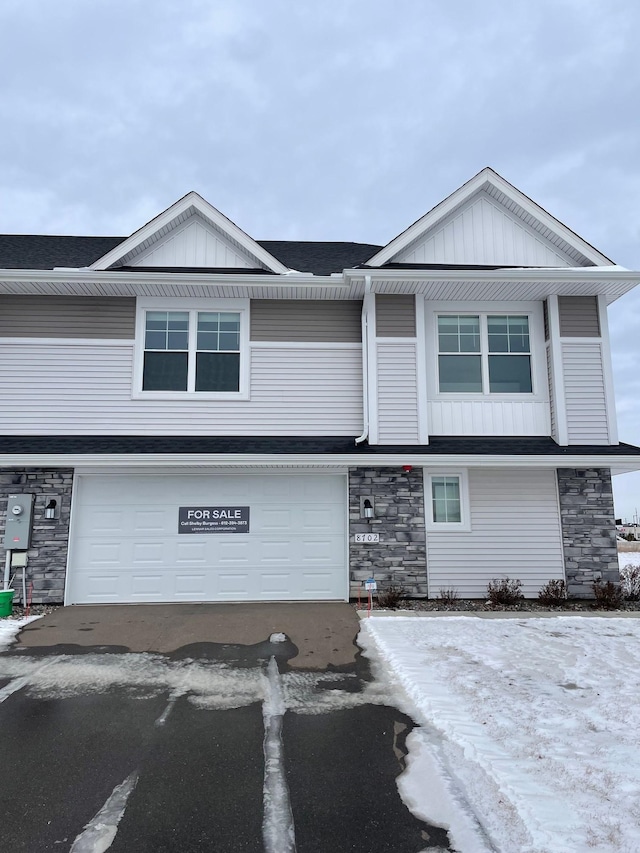 view of front of property with a garage