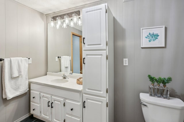 half bath with toilet and vanity