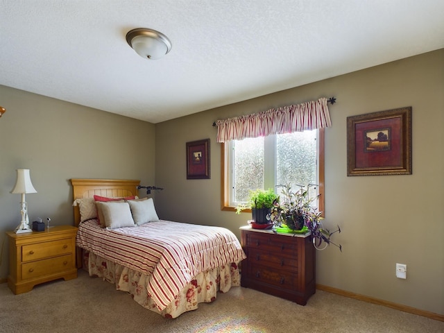 bedroom featuring baseboards