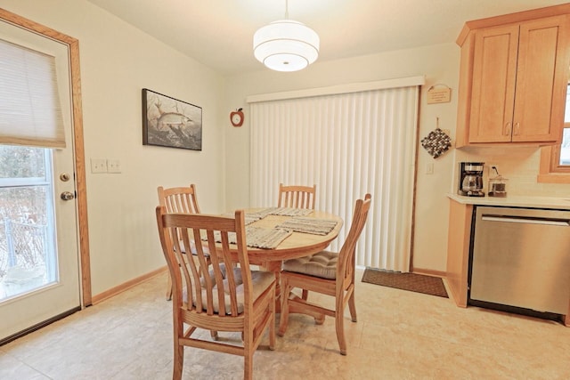 dining space with a wealth of natural light