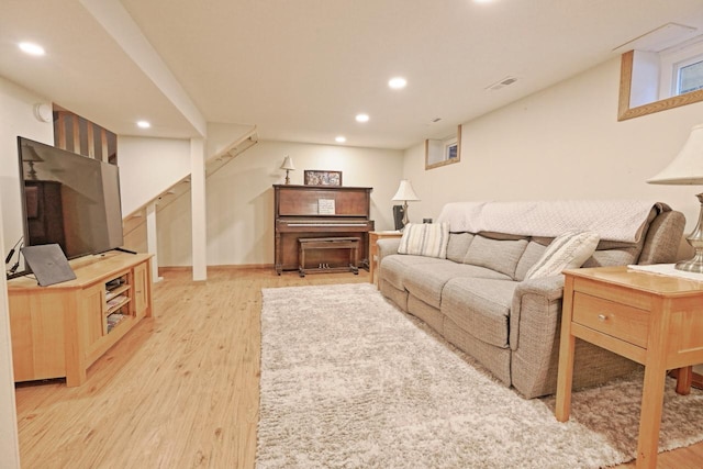 living room with light hardwood / wood-style floors