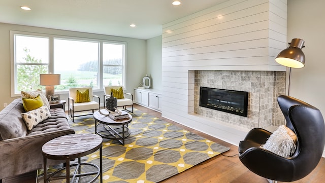 living room with a wealth of natural light and hardwood / wood-style floors