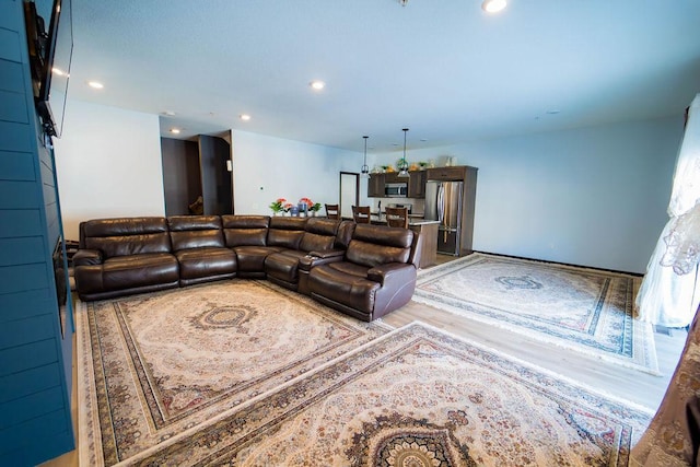 living room with hardwood / wood-style flooring