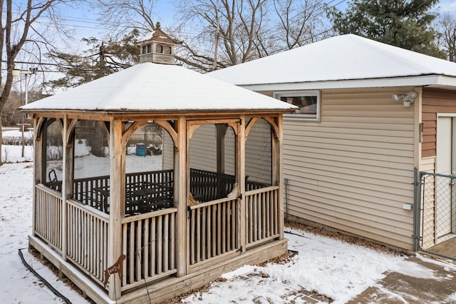 view of snow covered deck