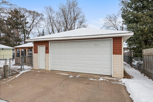 view of snow covered garage