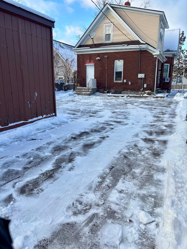 view of snow covered property