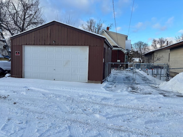 view of snow covered garage