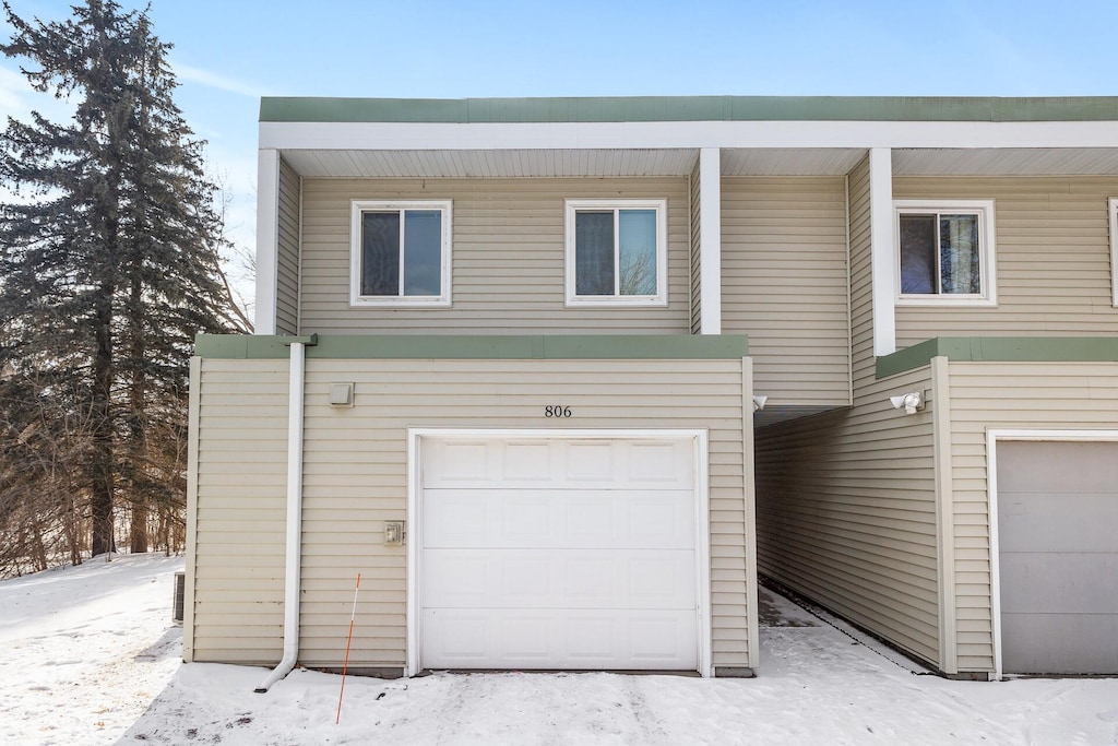 view of front of home with a garage