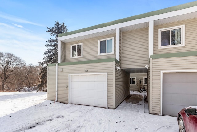 exterior space with a garage