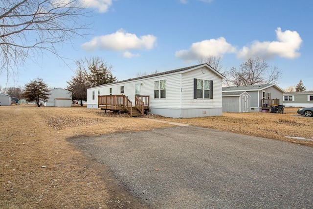 manufactured / mobile home featuring a deck