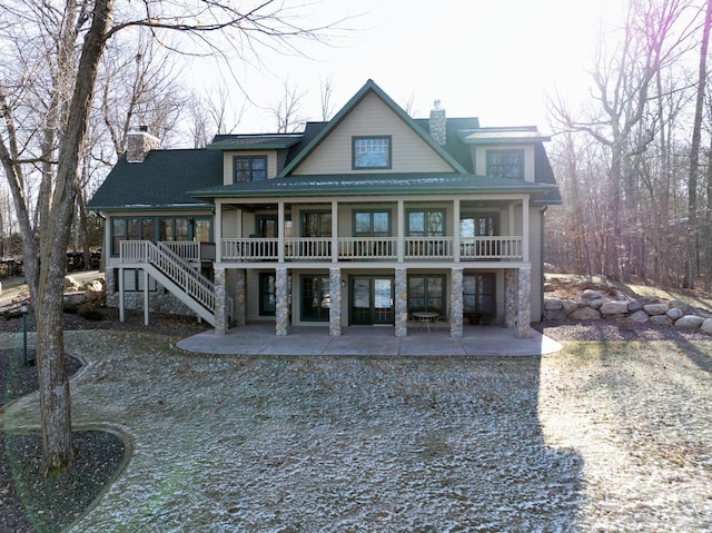 back of house featuring a patio