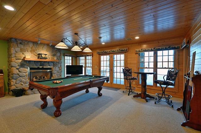 recreation room featuring carpet floors, french doors, and a healthy amount of sunlight