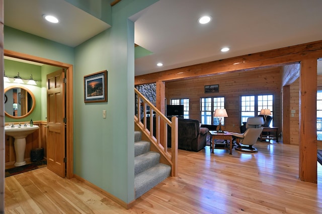 2772 25th Ave Unit B, Cedar Lake Twp, WI 54868 - stairs with hardwood / wood-style flooring, wooden walls, and recessed lighting