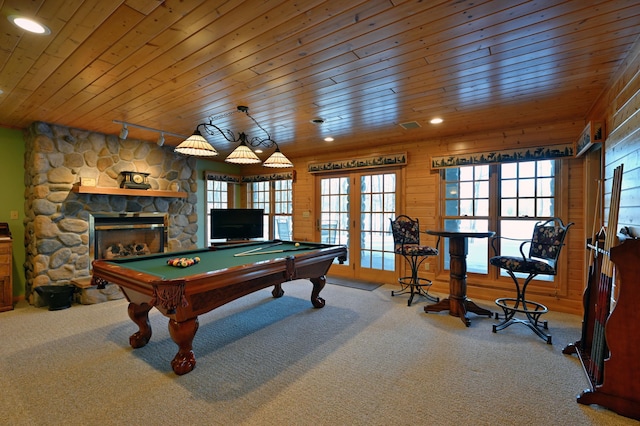 2772 25th Ave Unit B, Cedar Lake Twp, WI 54868 - rec room with carpet, wood ceiling, billiards table, a stone fireplace, and french doors