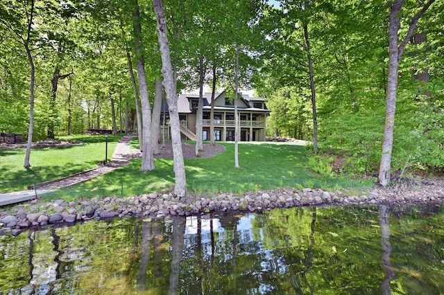2772 25th Ave Unit B, Cedar Lake Twp, WI 54868 - back of property featuring a lawn and a water view