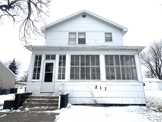 view of front of home featuring central air condition unit