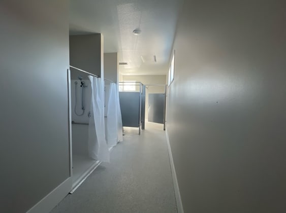 hallway with a textured ceiling