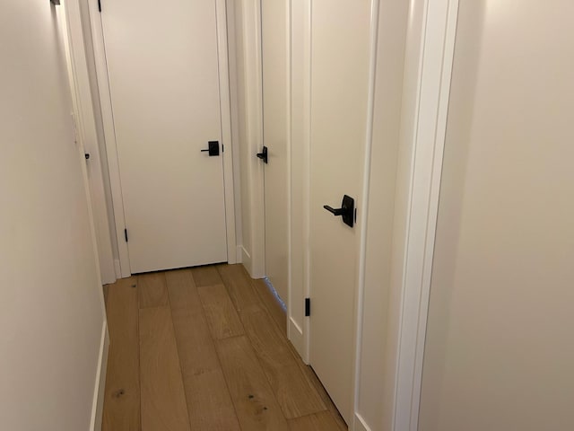 hall featuring light wood-style flooring