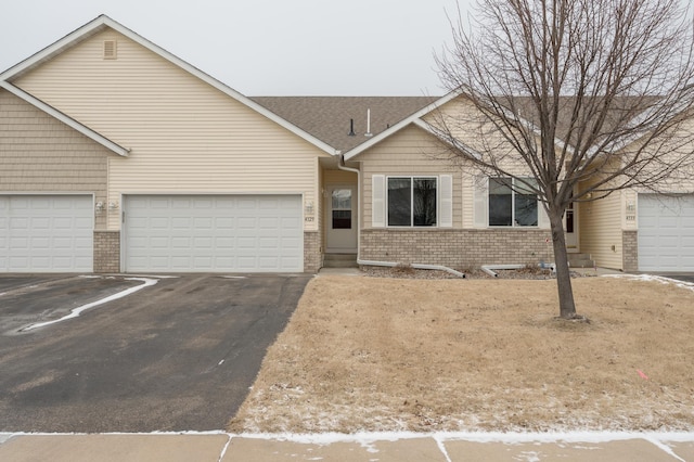 ranch-style home with a garage