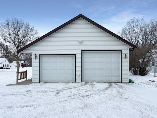 view of snow covered garage