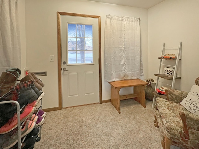 doorway featuring carpet floors