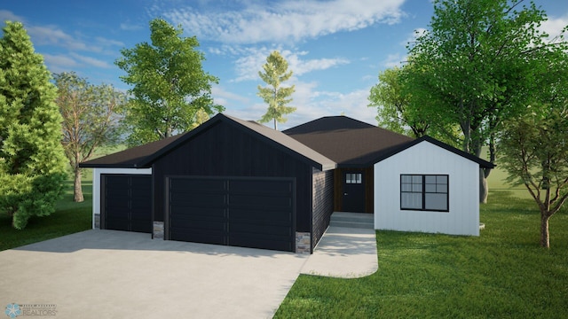 view of front of home with a garage and a front yard