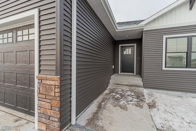 property entrance featuring a garage