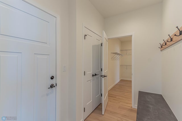 hallway featuring light wood-type flooring