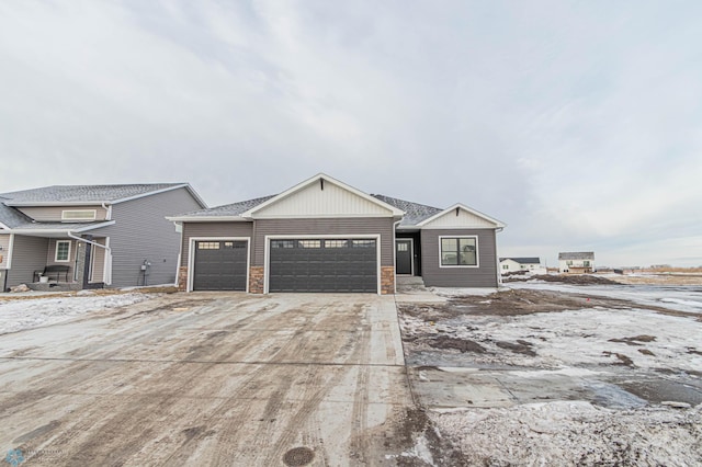 view of front of property with a garage