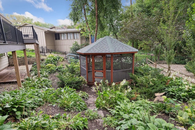 view of yard featuring a wooden deck