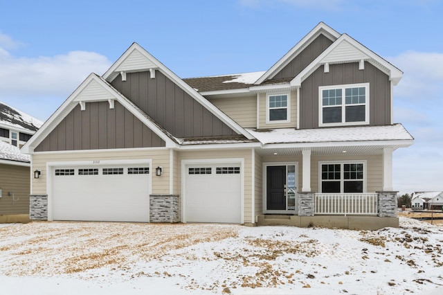 craftsman house featuring a garage and covered porch