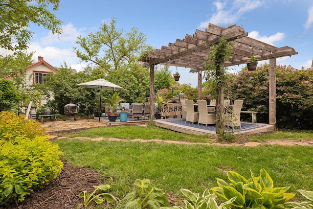 706 4th St, Red Wing, MN 55066 - view of yard featuring a pergola and outdoor dining space