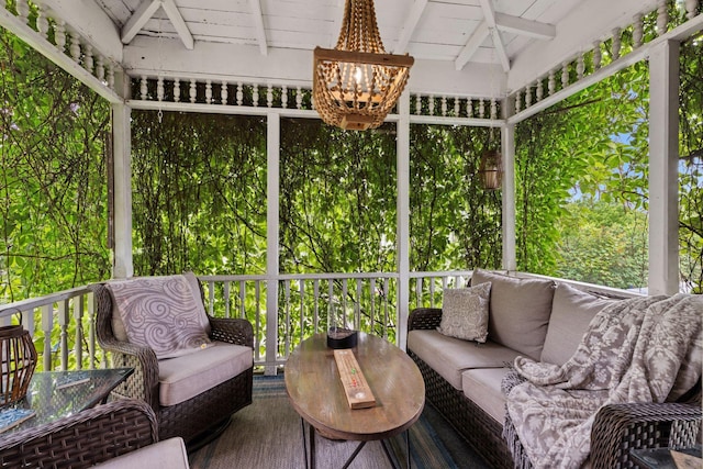 706 4th St, Red Wing, MN 55066 - sunroom with outdoor lounge area, healthy amount of natural light, and a ceiling fan