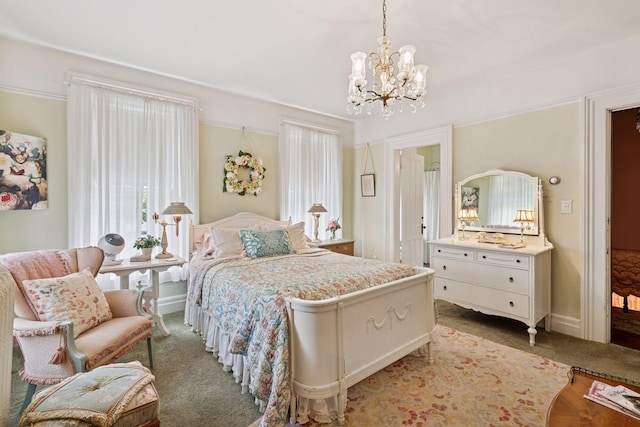 706 4th St, Red Wing, MN 55066 - bedroom featuring a chandelier and light colored carpet