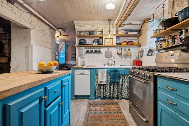 706 4th St, Red Wing, MN 55066 - kitchen with stainless steel gas range oven, dishwasher, blue cabinetry, open shelves, and wood ceiling
