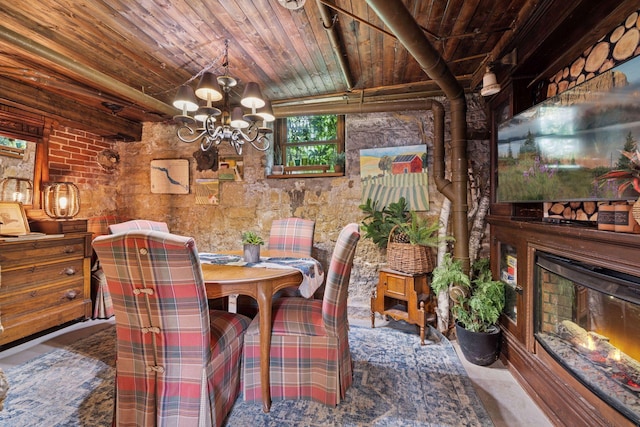 706 4th St, Red Wing, MN 55066 - dining room featuring wood ceiling, a chandelier, and a glass covered fireplace