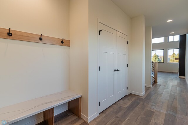 mudroom featuring recessed lighting, baseboards, and dark wood finished floors