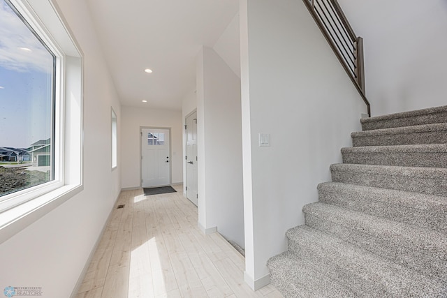 1264 Marlys Dr W, West Fargo, ND 58078 - staircase featuring recessed lighting and wood finished floors