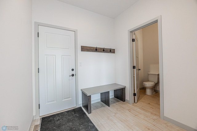 1264 Marlys Dr W, West Fargo, ND 58078 - mudroom featuring light wood-style flooring and baseboards