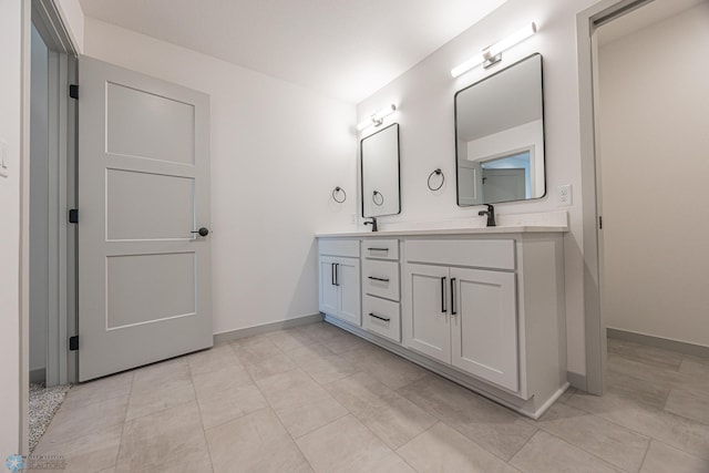 1264 Marlys Dr W, West Fargo, ND 58078 - full bath featuring double vanity and baseboards