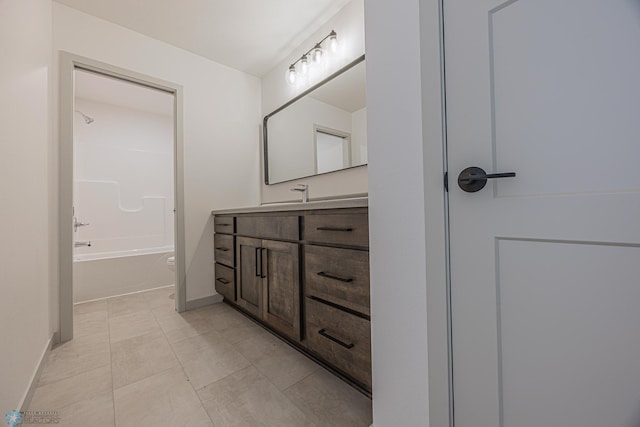 1264 Marlys Dr W, West Fargo, ND 58078 - bathroom with vanity,  shower combination, and tile patterned floors