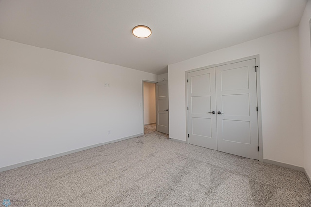 1264 Marlys Dr W, West Fargo, ND 58078 - unfurnished bedroom featuring light colored carpet and a closet