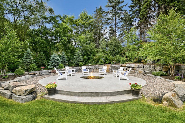 exterior space featuring an outdoor fire pit